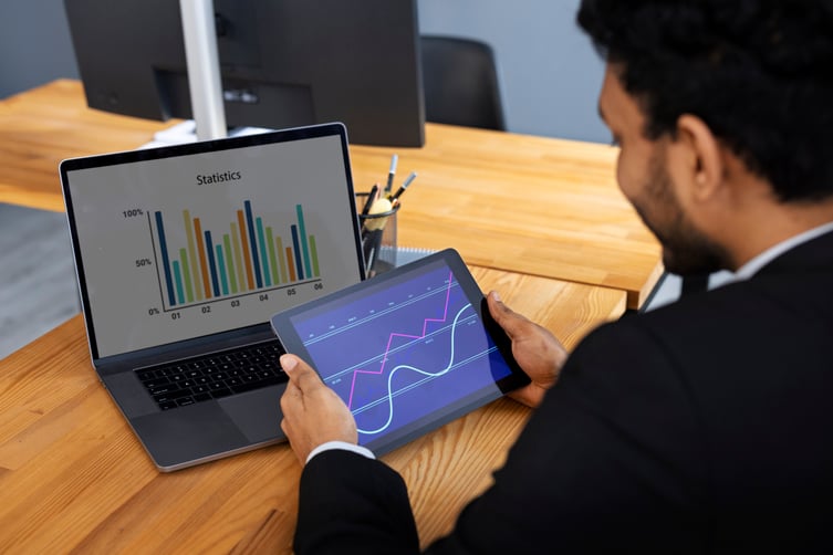 business-person-looking-finance-graphs